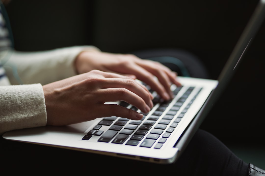 hero-01 person-using-laptop-vzjdyl5jvxy